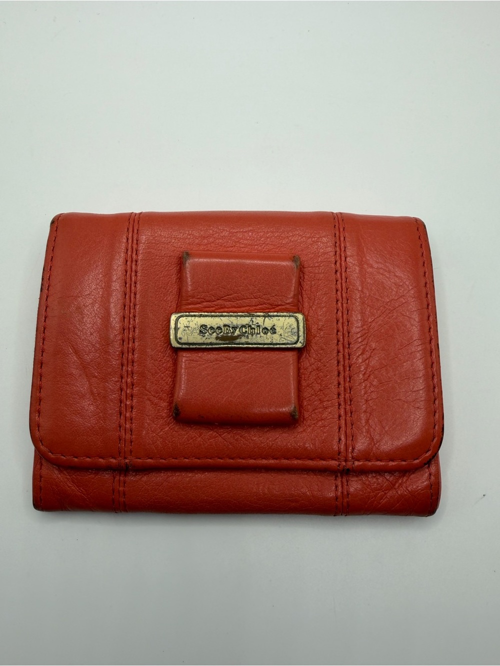 See By Chloe Coral-Orange Leather Compact Wallet with Logo Plaque